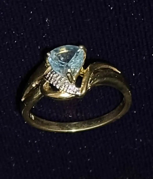 1.0 CTW Trillion-Cut Swiss Blue Topaz & Diamonds on a story black velvet background