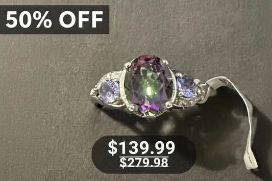 Gorgeous Womens 14K White Gold Over Solid Sterling Silver Diamonds 0.7 CTW Tanzanite and 3.25 CTW Mystic Topaz Size 7 Designer Ring
Gemstones, on a black and gray background with a 50% off banner was $279.98 now 139.99