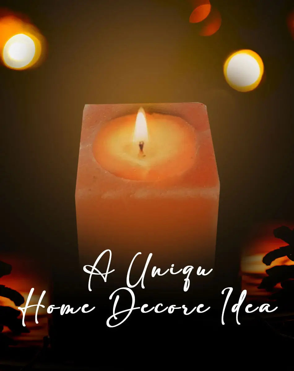 Close-up of a glowing salt candle with 'A Unique Home Decor Idea' text against a moody, blurred bokeh background.