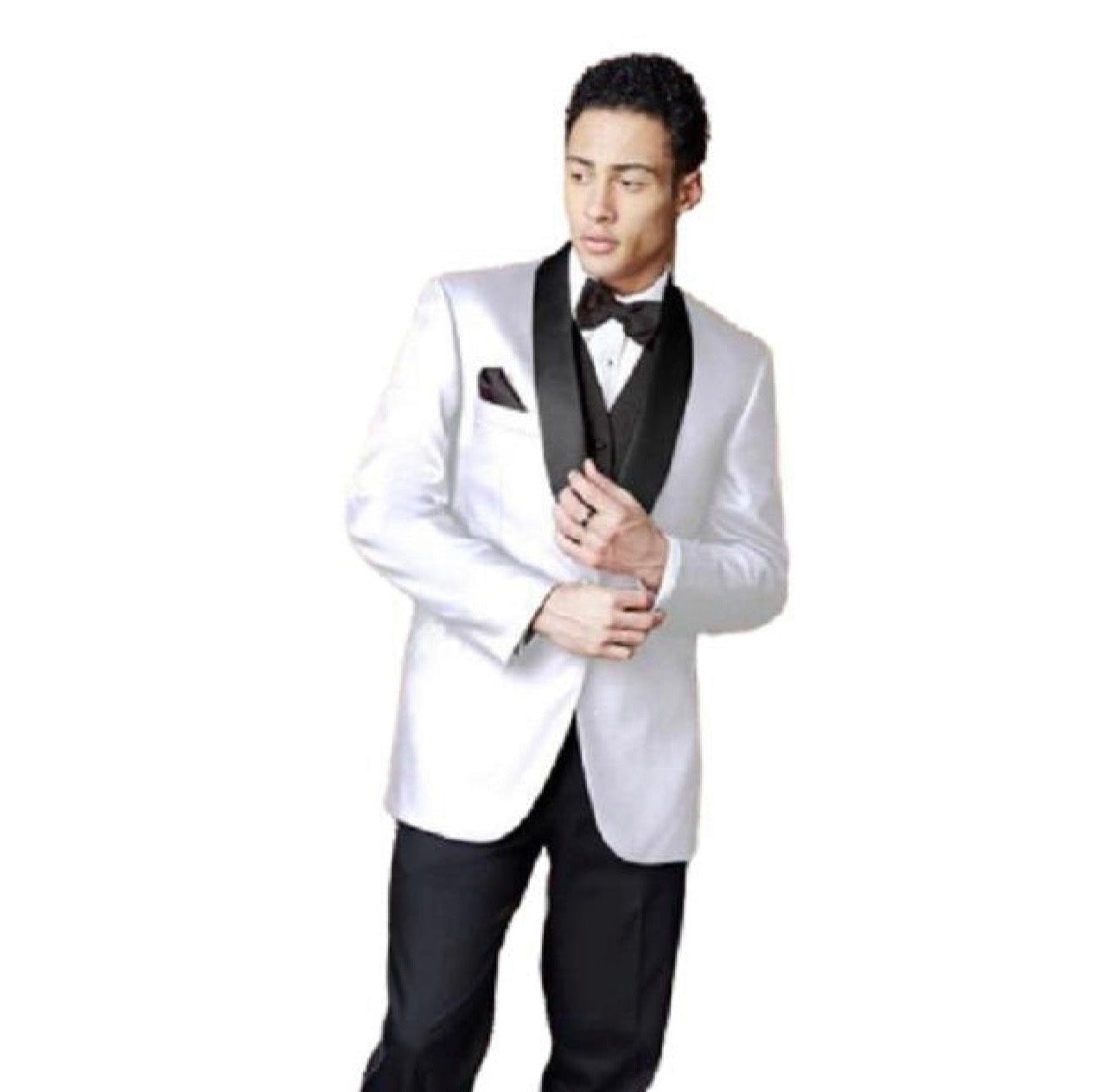 Man wearing a white tuxedo with black lapels on a white background