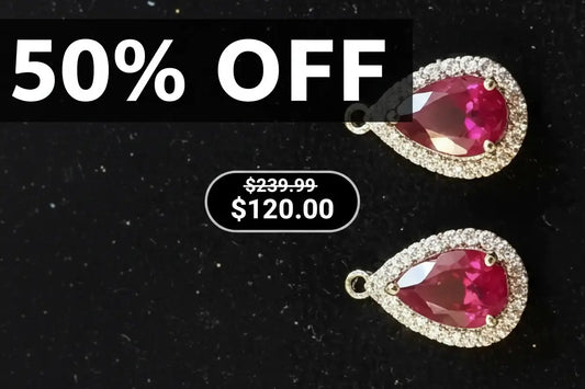 Stunning Womens 10K Yellow Gold 28 Diamonds and 1.0 CTW Ruby Designer Earrings, shown on a black velvet background with a large '50% OFF' sale banner and price overlay.
 $120.00 was $239.99
