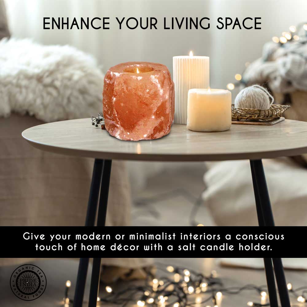 Decorative salt candle holder on a coffee table styled with accents and text about enhancing modern living spaces.