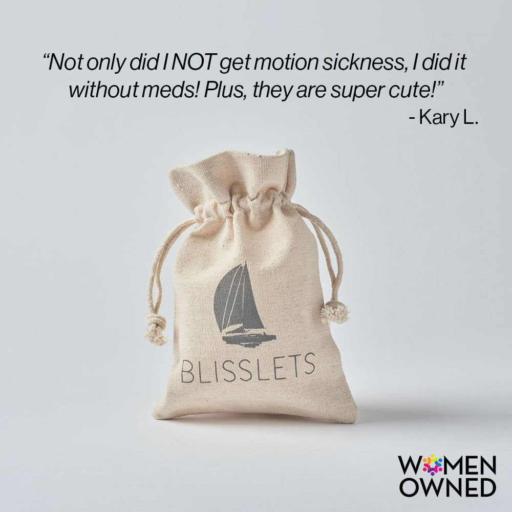 Beige drawstring bag with sailboat design and 'Blisslets' text on a light gray background, featuring a quote and 'Women Owned' badge.