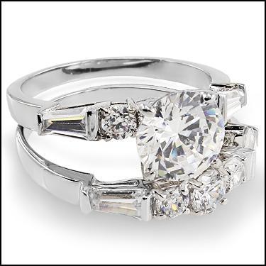 Two-piece sterling silver bridal set featuring a round brilliant-cut center stone with a shimmering halo setting, paired with a matching pavé-style eternity wedding band, displayed against a white background.