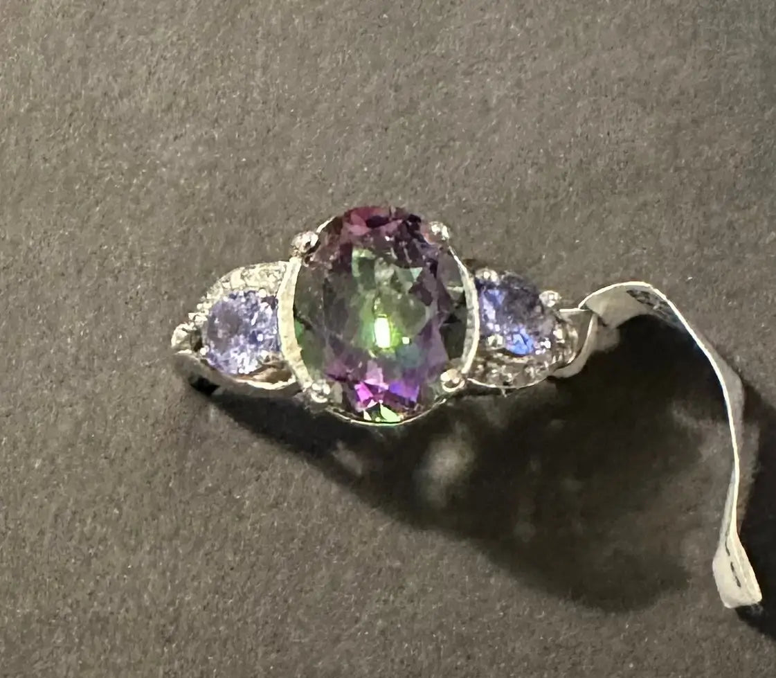AAA Tanzanite & Mystic Topaz in 14K White Gold Over Sterling Silver on a dark surface