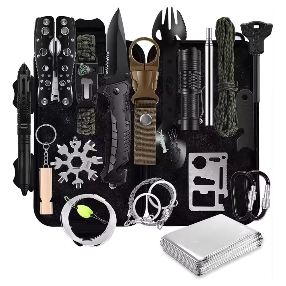 Collection of survival tools and accessories on a black background
