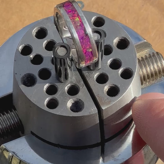 "Cosmic Heart" Archive Band: Pink Fire Opal & .925 Silver Size: 6.5, on a Jewelers ball vise.