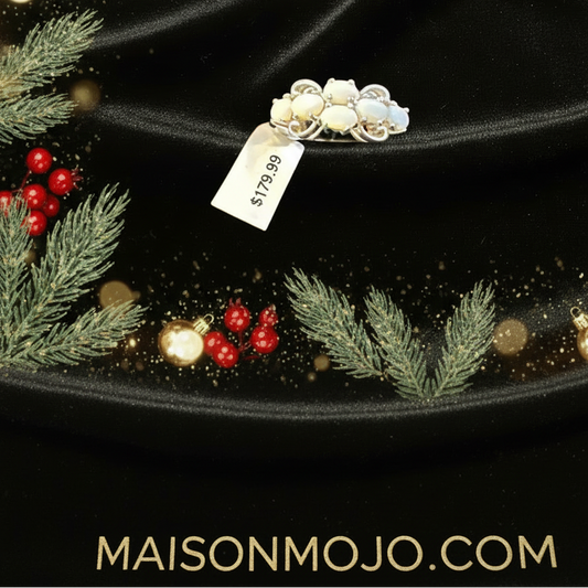 White opal ring on Christmas backdrop with ornaments - $179.99